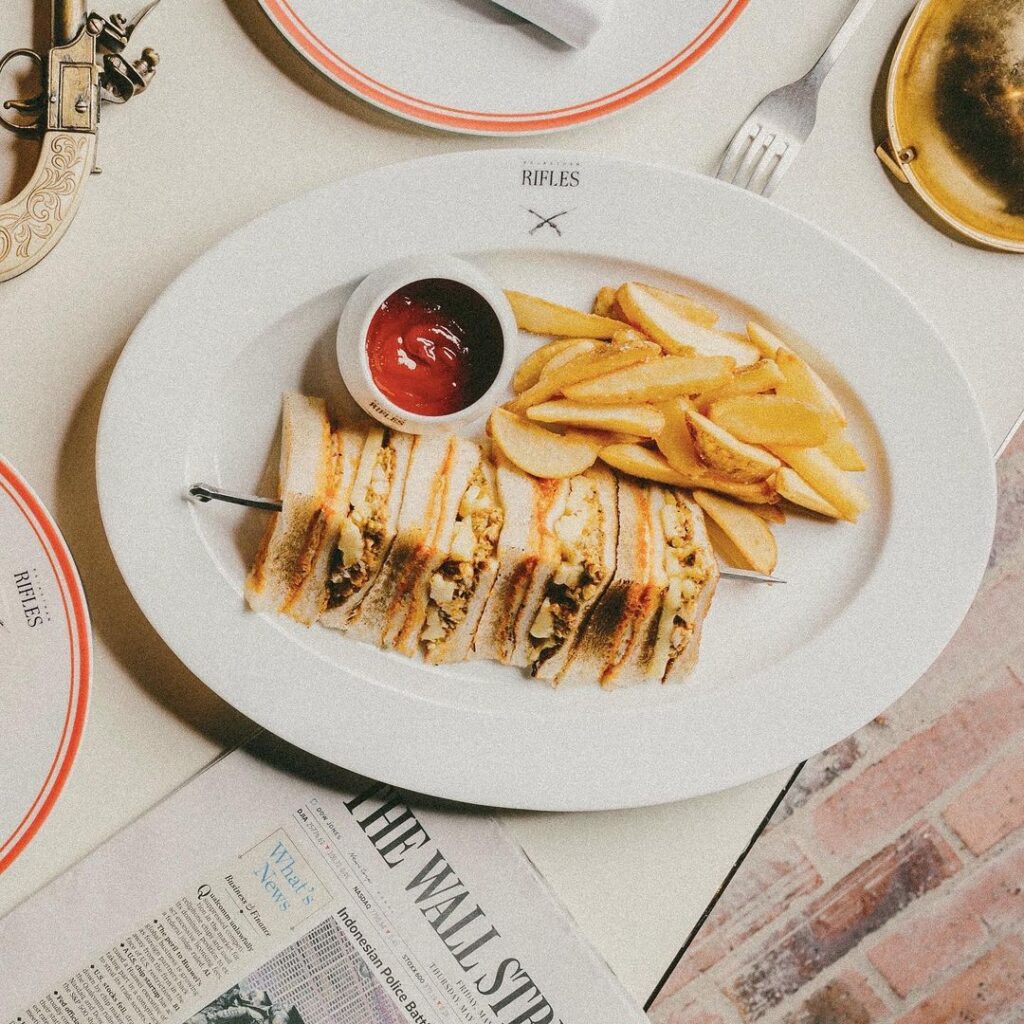 Rajasthan Rifles Club Sandwich paired with thick-cut fries