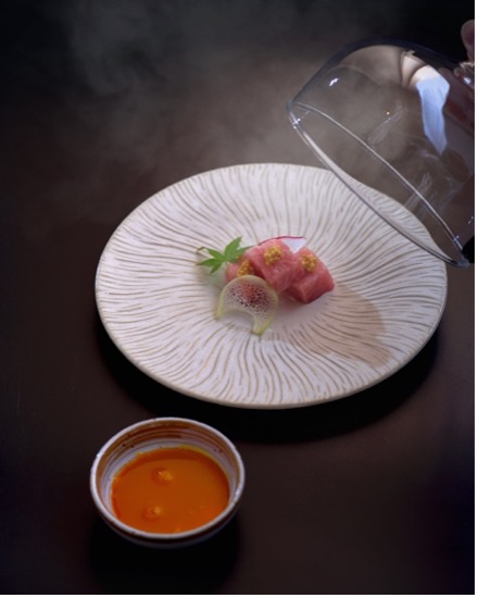 An image of smoked Fatty Tuna and Shikoku Egg with Soy Sauce from ODDS Japanese Restaurant